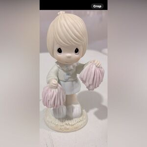 Charming Figurine with Pink Accents